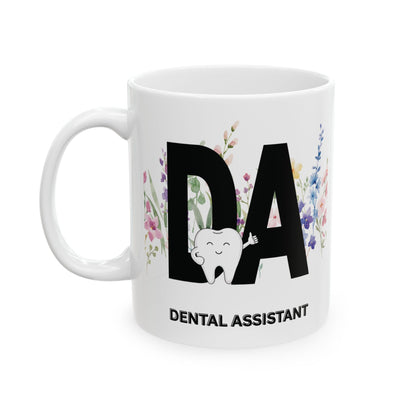 White mug with 'DA Dental Assistant' design featuring a tooth and flowers on a white mug