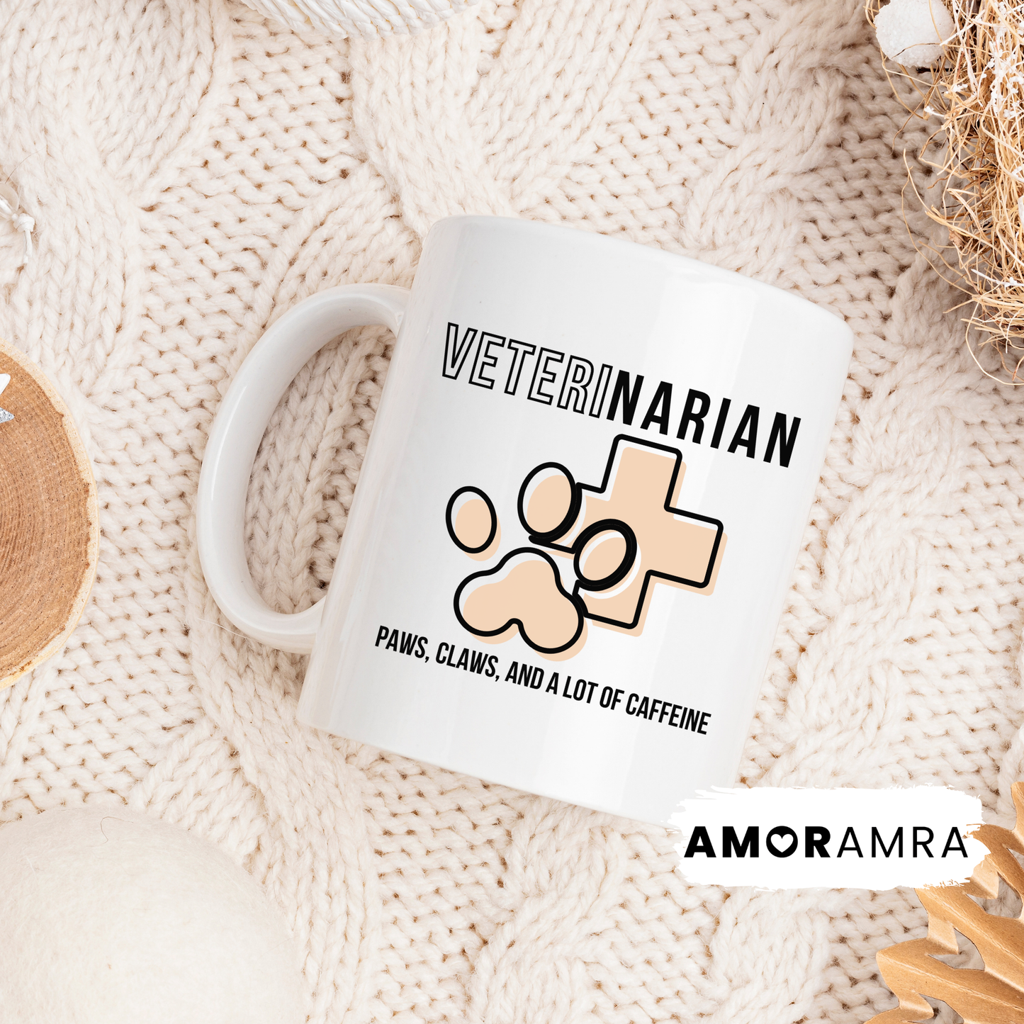 White mug with 'VETERINARIAN' text and paw print design on a textured surface, featuring the AMORAMA brand.