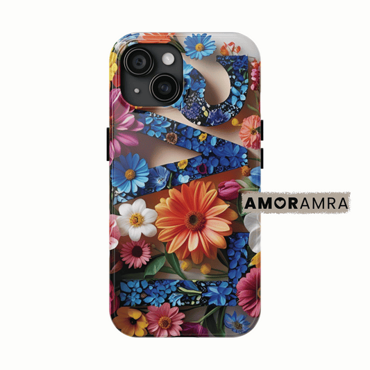 Phone case with colorful floral design Bold LOVE Bouquet iPhone Case.  floral LOVE iPhone case. Pink, orange, deep blues, and leafy greens bloom with the word 'Love' in the middle, like your favorite flower garden turned into art. 