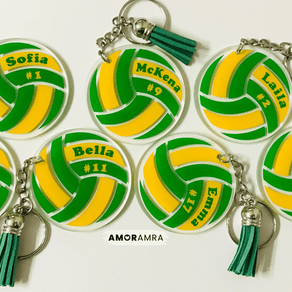 Volleyball-shaped keychains with personalized names and numbers on a white background, featuring the brand 'AMORAMRA'.