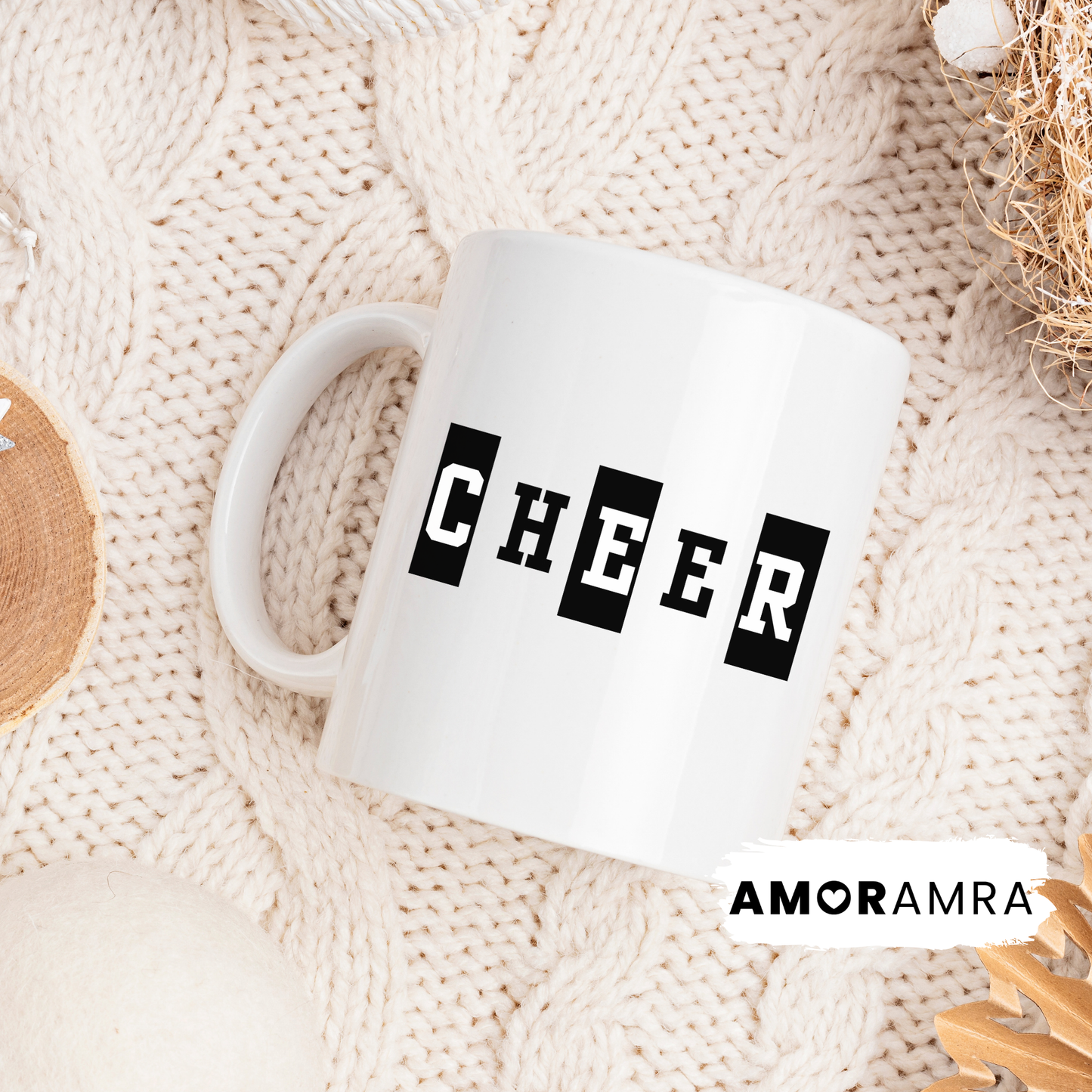 White mug with 'CHEER' text