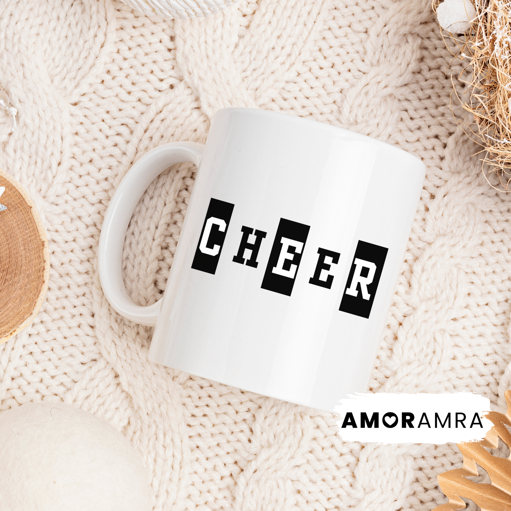 White mug with 'CHEER' text