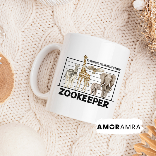 White mug with animal design and 'Zookeeper' text. My job is wild, but my coffee is tamed text