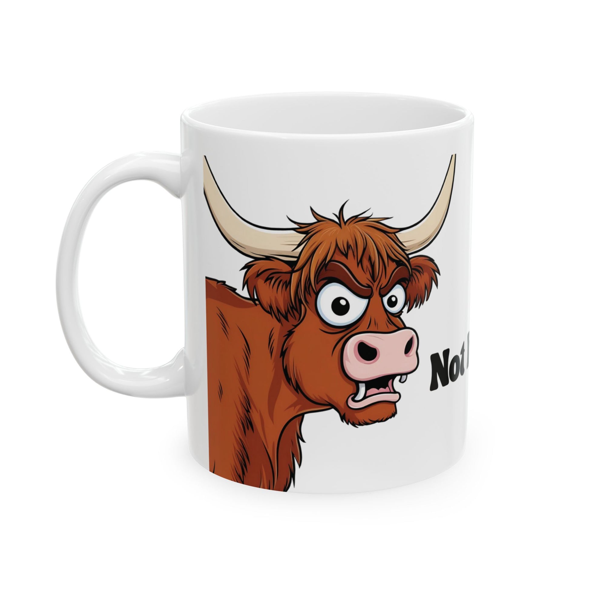 White mug with a cartoon bull design on a white background text not in the mood