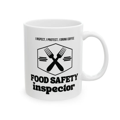 white mug with food safety inspector, i inspect, i protect i drink coffee text with forks crisscrossing image