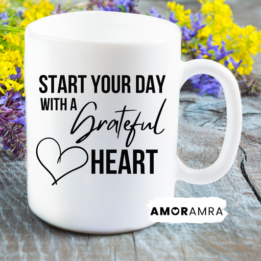 White mug with motivational quote 'start your day with a grateful heart'
