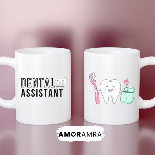 Two white mugs with dental-themed designs on a pink background, featuring dental assistant text. smiling happy tooth holding a toothbrush and floss