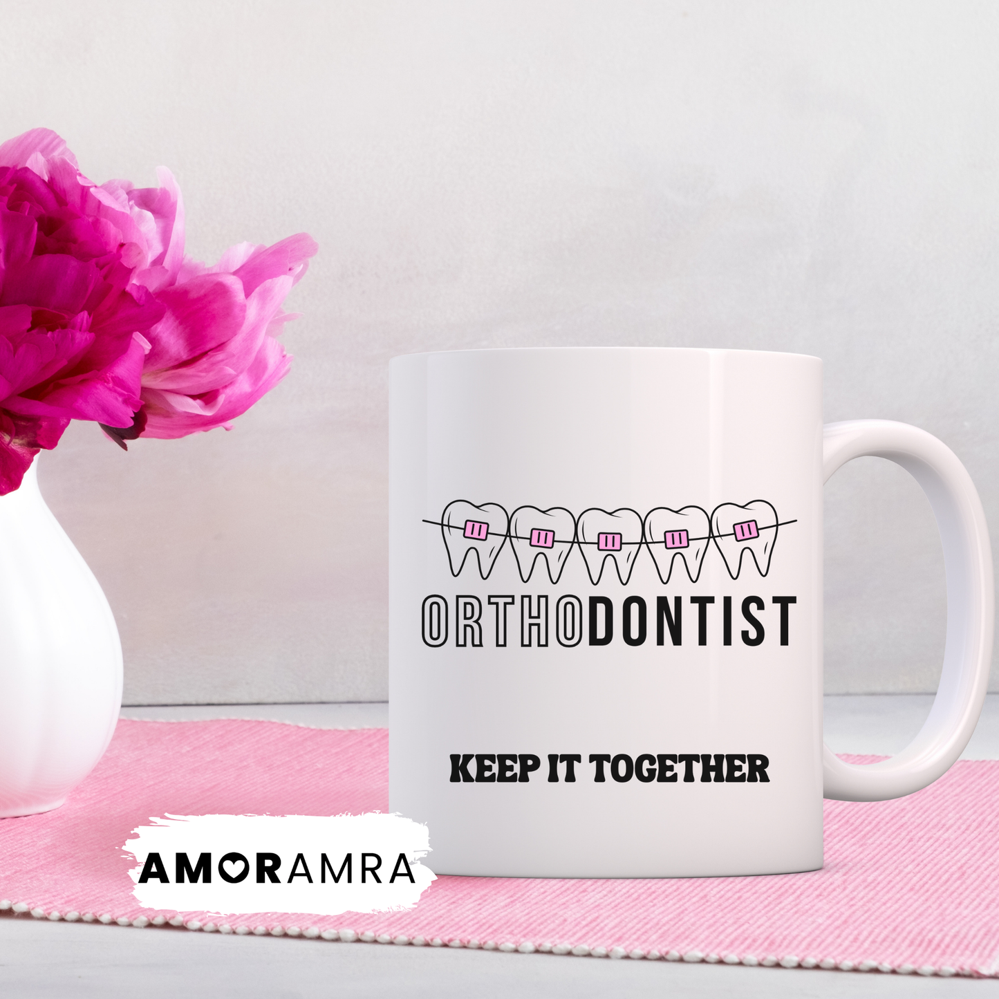 White mug with 'Orthodontist Keep It Together' with pink braces design