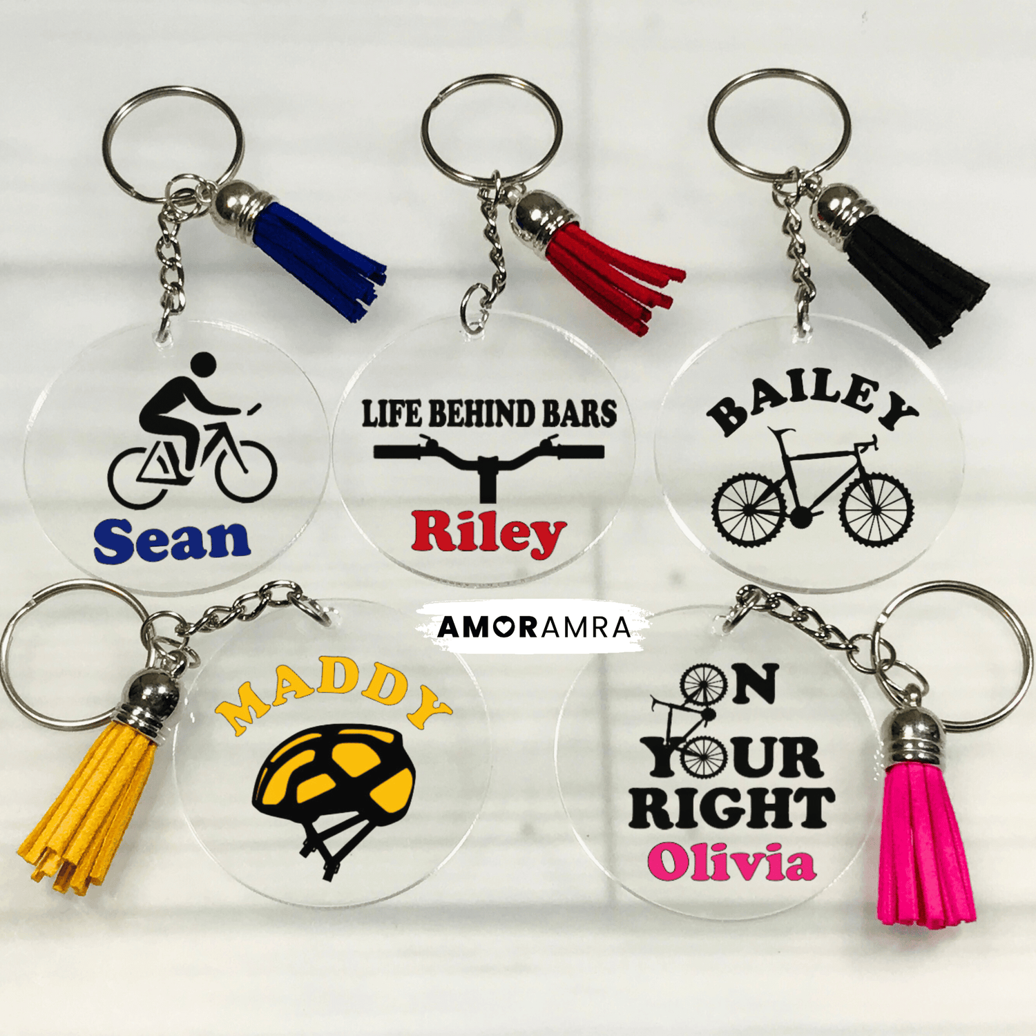 Set of personalized keychains with bicycle-themed designs and names. May include: Five round, clear acrylic keychains with bike-themed designs and tassels. Personalized Cycling Keychain, Cyclist Bag Tag, Bike Keychain, Bike Chain, Cycling Keyring, Bike Rider Gift, Road Cycling Gift, Cyclist Gift, on your right keychain