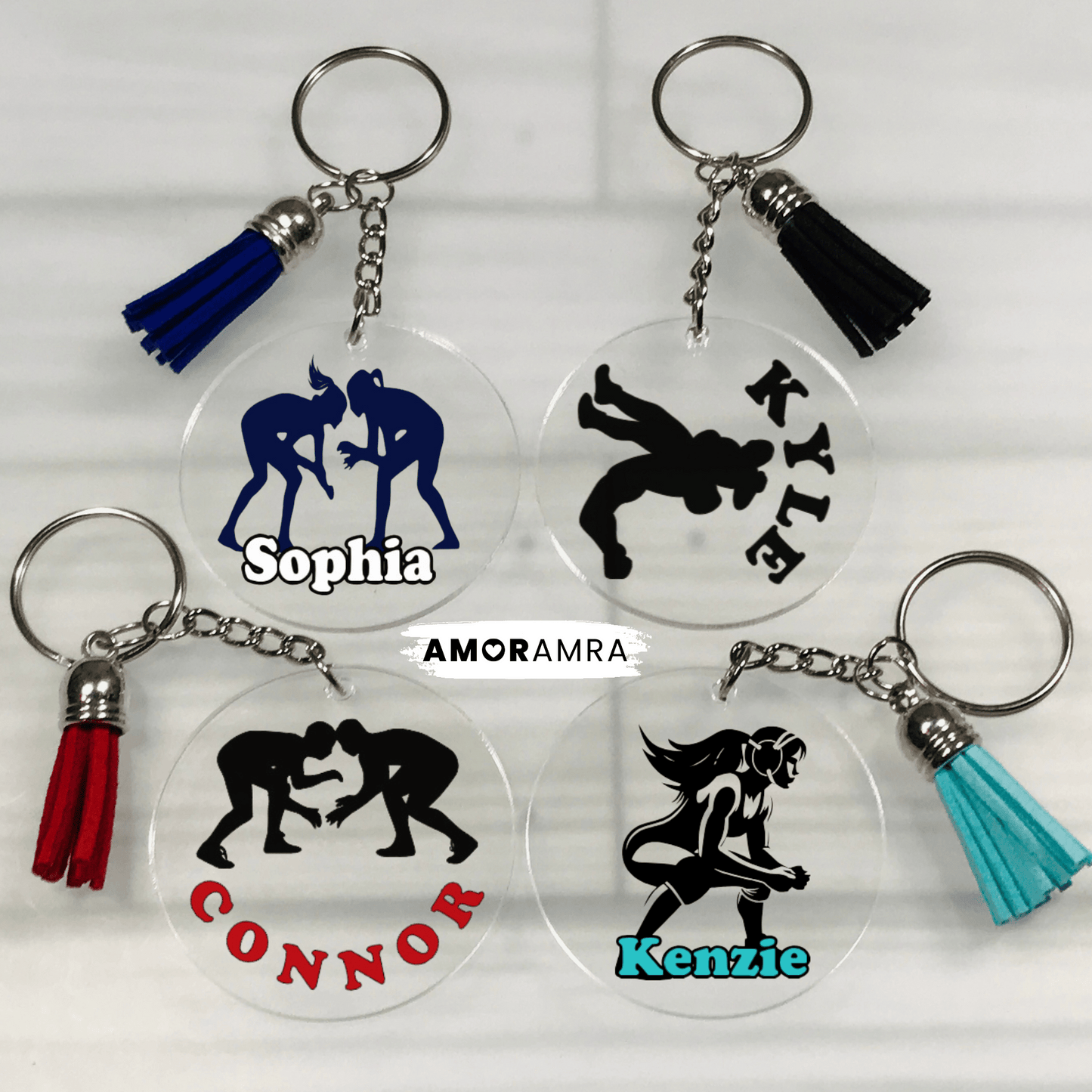 Four keychains with wrestling figures and names on a white background. Personalized Wrestling Keychain, Wrestler Keychain, Wrestling Team Gift, Wrestling Bag Tag, Wrestling Name Tag, Wrestling Singlet Keychain, girl wrestling gift keychain, wrestling, female wrestling keychain, wrestling coach gift