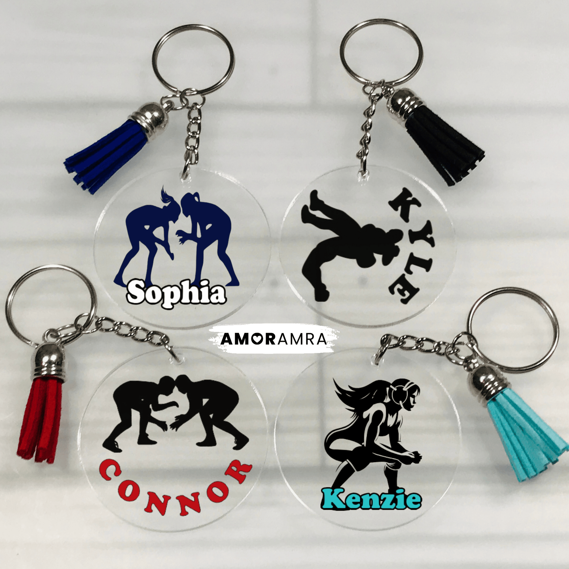 Four keychains with wrestling figures and names on a white background. Personalized Wrestling Keychain, Wrestler Keychain, Wrestling Team Gift, Wrestling Bag Tag, Wrestling Name Tag, Wrestling Singlet Keychain, girl wrestling gift keychain, wrestling, female wrestling keychain, wrestling coach gift