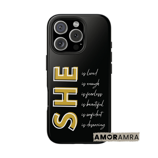 Black phone case with gold text 'SHE' and motivational quote. She is loved. She is enough. She is fearless. She is confident. She is beautiful. She is deserving.  a daily affirmation iphone case With bold gold lettering on a sleek black background